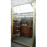 A large 20th century gilt framed rectangular wall mirror, 241cm wide x 148cm high.