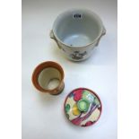 A Clarice Cliff circular pot and cover decorated in the `Pastel Autumn' pattern, 10cm diameter,