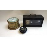 A Negretti and Zambra temperature recorder, early 20th century, in an ebonised tin case, 29cm wide,