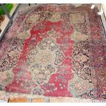 A Kerman rug, 296cm x 194cm.