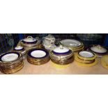 A large Minton dinner service to include, side plates, starter plates and tureens,