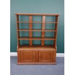 A 19th century scumble painted pine bookcase cupboard,