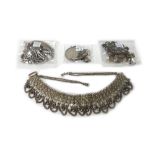 Mostly silver jewellery, comprising; a charm bracelet, an identity bracelet, two further bracelets,