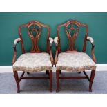 A pair of late 19th century Hepplewhite design mahogany framed carver chairs,