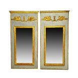 A pair of 20th century parcel gilt blue painted rectangular wall mirrors,