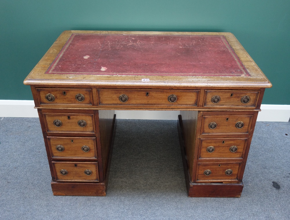 A 19th century mahogany pedestal desk, with nine drawers about the knee, on plinth base, 105cm wide.