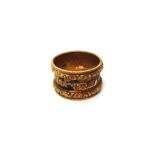 An 18ct gold and formerly black enamelled mourning band ring,