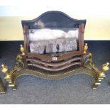An 18th century style steel and brass fire basket, with pierced serpentine front and urn finials,