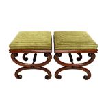 A pair of William IV mahogany framed square top footstools, on 'X' frame supports,