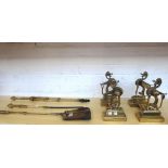 A set of three Victorian brass fire irons with poker work decoration to the handles,