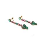 A pair of cabochon emerald, cabochon ruby and gem set earrings, the tops having screw fittings.