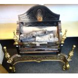 An 18th century style steel and brass fire basket, with pierced serpentine front and turned finials,