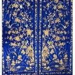A good pair of Chinese embroidered silk curtains and a pair of side panels, early 20th century,