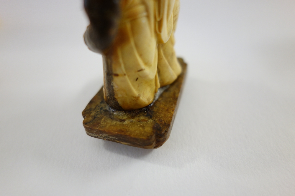 A small Indian ivory carving of a man and child, late 19th/early 20th century, - Image 6 of 9