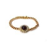 A gold, half pearl and carbuncle garnet set bracelet,