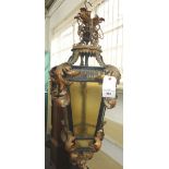 A wrought iron hexagonal hall lantern early 20th century,