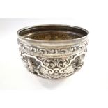 A small silver repousse bowl, Indian or Burmese, circa 1900,