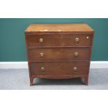 A George III mahogany chest of three long drawers, on splayed bracket feet, 91cm wide.