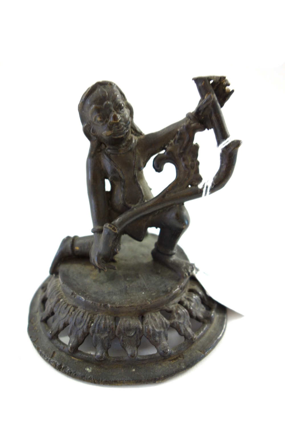 An Asian bronze figure of a man, probably Tibetan, 19th century,