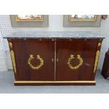 In the manner of Jacob Desmalter; an Empire Revival gilt metal mounted side cabinet,