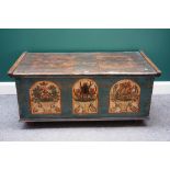 A 19th century Tyrolean polychrome painted rectangular pine trunk, with side carrying handles,