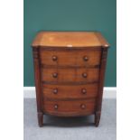 A late 19th century mahogany bow front chest with four long drawers flanked by split reeded columns,