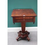 A late William IV rosewood work table, the lift top enclosing a fitted interior over single drawer,