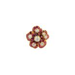 A gold, diamond and synthetic ruby ring, designed as a flowerhead,