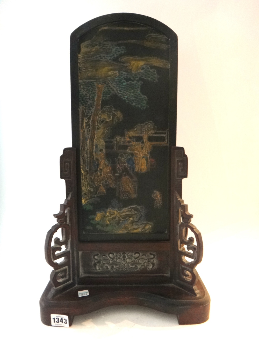 A large Chinese moulded ink cake and wood stand, 20th century,