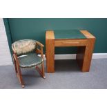 An Art Deco oak writing desk, with single frieze drawer, each pedestal with end cupboards,