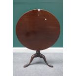 An 18th century mahogany occasional table, the circular snap top on a tripod base, 80cm wide.