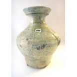 A Chinese green glazed pottery wine jar, Hu, Han Dynasty,