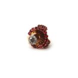 A gold, diamond and synthetic ruby set cocktail ring,