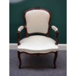 A 18th century faux rosewood open armchair, with serpentine seat on cabriole supports.