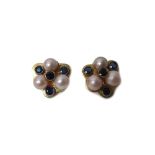 A pair of gold, cultured pearl and sapphire set earclips, each of trefoil form,