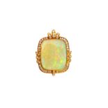 A gold, opal and diamond set pendant, in a shaped rectangular panel shaped design,