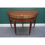 A 19th century brass inlaid mahogany double foldover tea/games table, on tapering square supports,