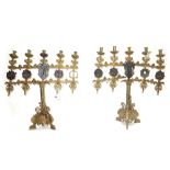 A pair of Continental bronze five branch altar candelabra of Gothic form,