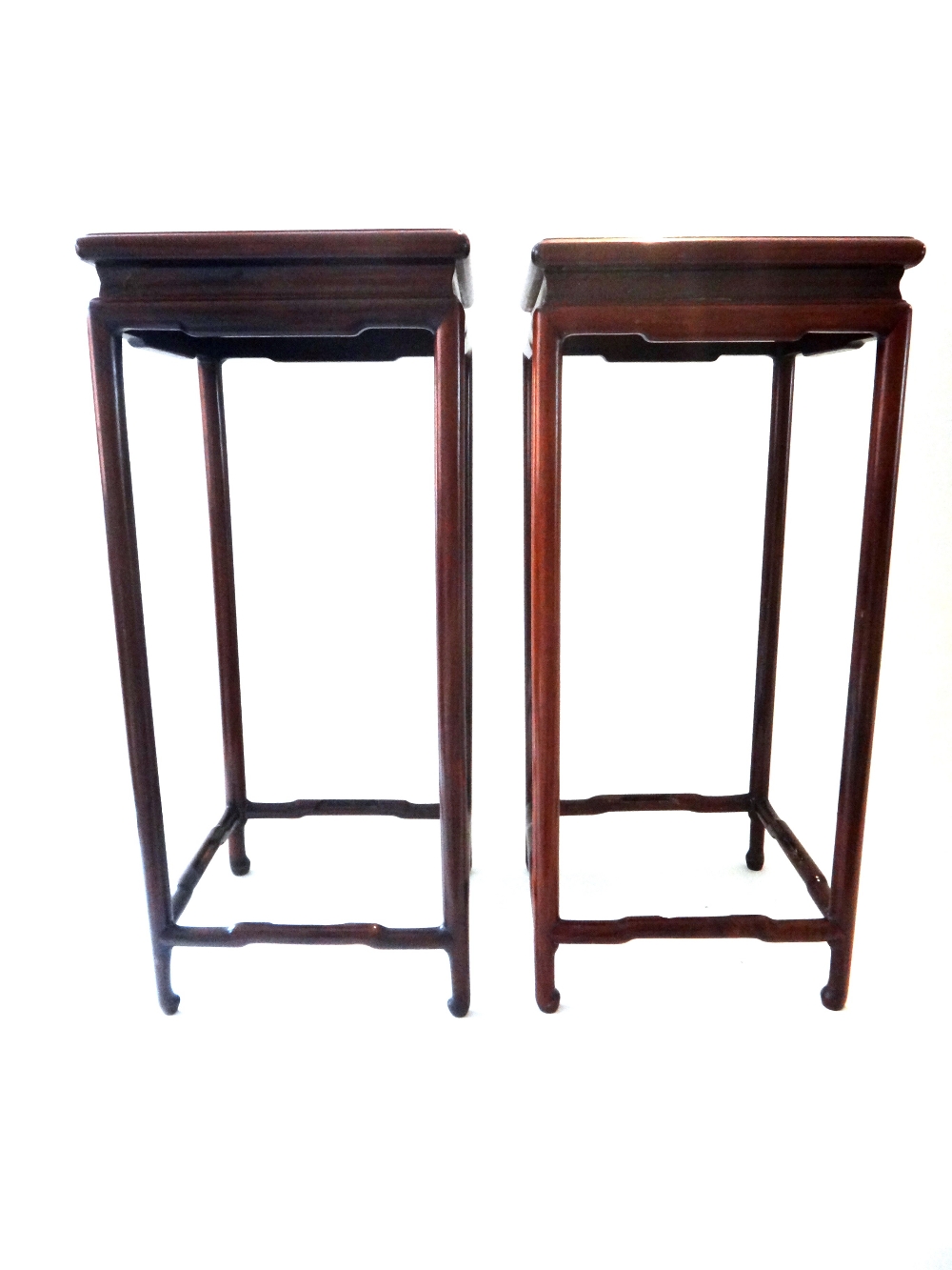 A pair of Chinese hardwood stands, 20th century,