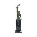 After Pierre le Faquays, a bronze model of Victory mounted on a polished marble base,