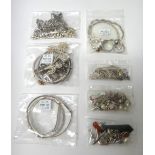 Silver and other jewellery, comprising; two curb link neckchains, seven necklaces and neckchains,