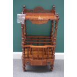 A Victorian inlaid walnut Canterbury whatnot with pierced gallery, on turned supports,