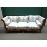 A 19th century French walnut framed square back sofa, with floral chased frame, on scroll supports,