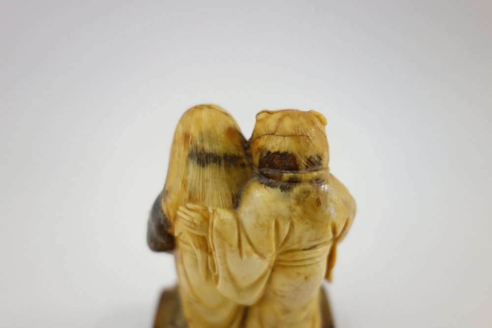 A small Indian ivory carving of a man and child, late 19th/early 20th century, - Image 9 of 9