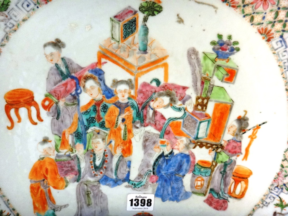 A Chinese famille-rose circular dish, circa 1900, painted with figures at leisure amongst tables, - Image 3 of 4