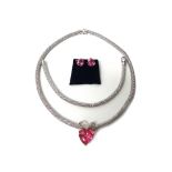 A 9ct white gold collar necklace, in an interwoven design, on a sprung hook shaped clasp,