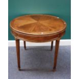 A Louis XV style brass mounted mahogany circular centre table,