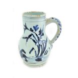 A Delft blue and white baluster mug, 18th century,