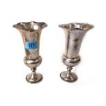 A pair of Edwardian silver trumpet shape flower vases, William Comyns, London 1905, 18cm high,