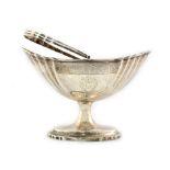 A George III Irish silver sugar basket, Dublin 1801, makers mark rubbed, navette shape,